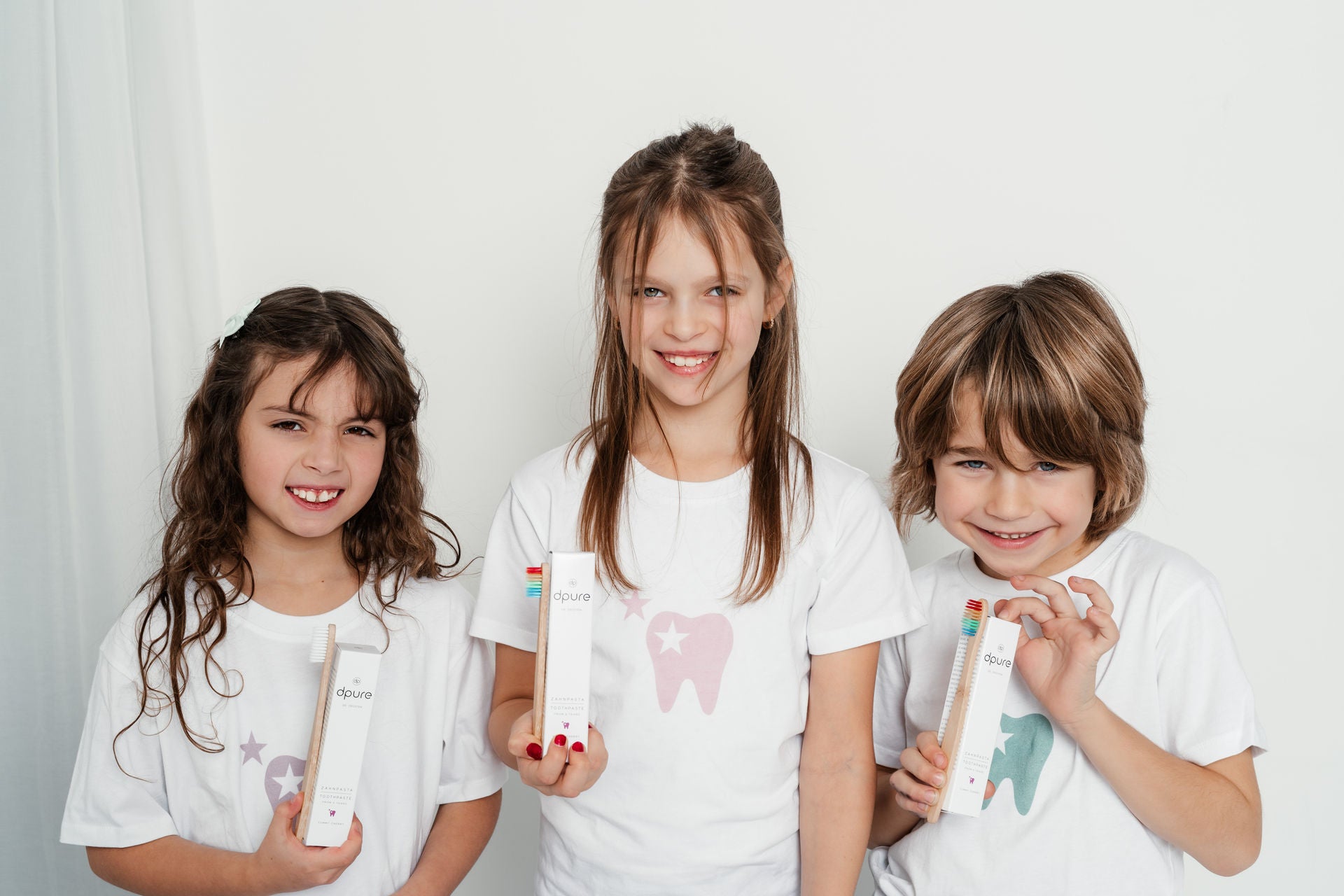 2er Set aus dpure Kinderzahnpasta soft berry & dpure Junior Zahnpasta yummy cherry